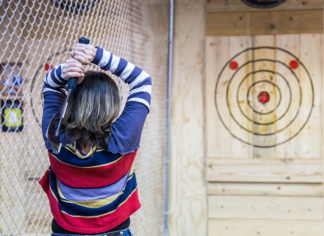 A new axe throwing venue that also serves beer is now open in Brandon