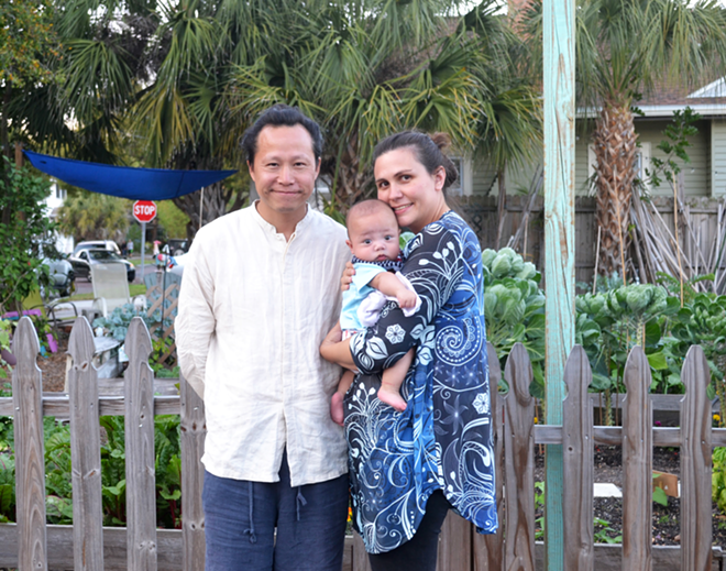 Oriental Zen Tea owners Jacky Lee and Kristin Johnson, with their son, David. - Ryan Ballogg