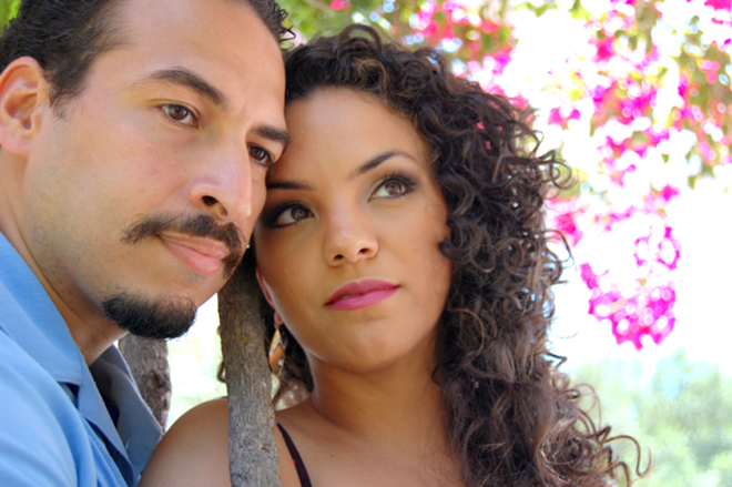 LOVE, INTERRUPTED: In How the Garcia Girls Lost Their Accents, a scheme separates Sofia (Marlene Peralta) from Manuel Gustavo (Cornelio Aguilera). - PHOTO COURTESY OF STAGEWORKS THEATRE