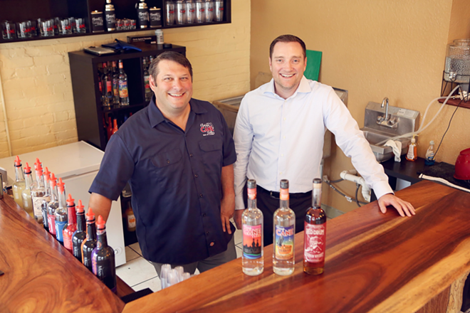 CHIPPING AWAY: For the last three years, owners Lee Nelson (L) and Pat O’Brien have been working tirelessly to pass the Craft Distiller Bill. - PHOTO COURTESY OF FLORIDA CANE DISTILLERY