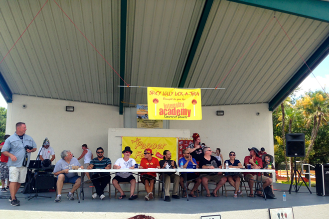 Nine contestants compete for the Pinellas Pepper Fest's Best Licker award. - Amy Daire