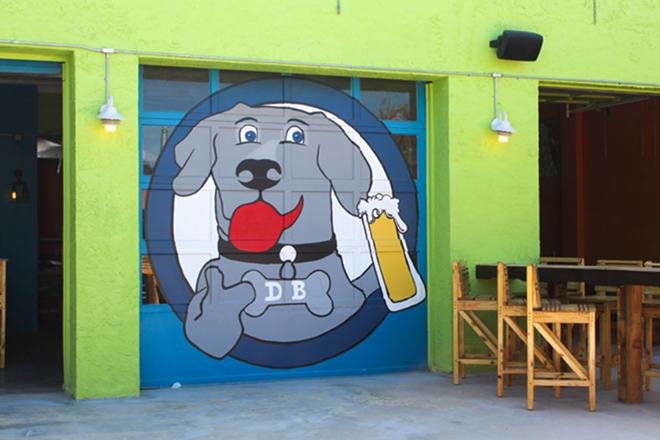 Dog Bar's pooch logo pays homage to co-owner J.P. Brewer's Weimaraner. - Paige Butterfield