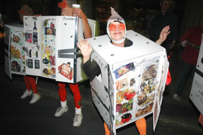 MAKING A STINK: Revelers parade in New Orleans last Halloween dressed as spoiled refrigerators. And the credit is: - David Rae Morris