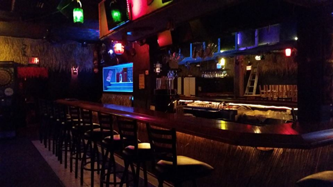 A view of Red Tiki Bar's low-lit bar area. - Red Tiki Bar via Facebook