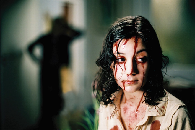 A production still from 'Let the Right One in,' which screens at Epicurean Hotel in Tampa, Florida on February 13, 2019. - Magnolia Pictures