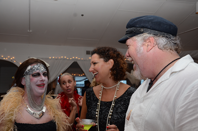 Mayor Sam Henderson and his wife Laura talk with last year's Gecko Queen at the 2014 Gecko Ball. - Cathy Salustri