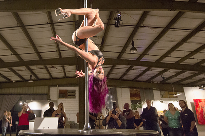 Creative Loafing Lust List award winner Ms Aly shows her award-winning style in a pole dance at Nude Nite 2015. - Chip Weiner