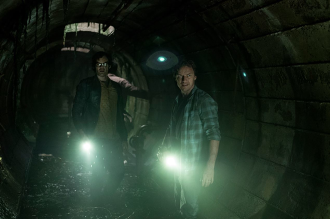 Richie (Bill Hader, left) and Bill (James McAvoy) descend into the sewer for their climatic fight against an ancient evil. - Brooke Palmer/Warner Bros. Pictures