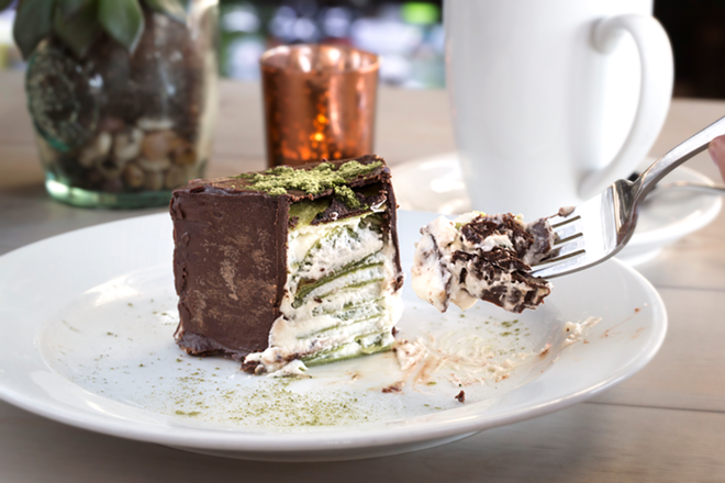 The crêpe cake's thin green tea pancakes alternate layers of cream. - Chip Weiner