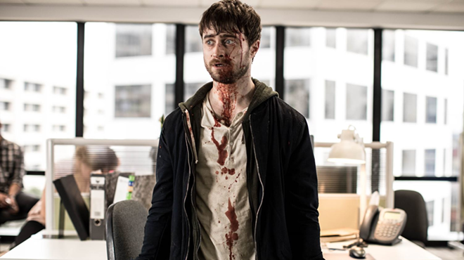 This is Miles (Danile Radcliffe). Miles is having the worst day of his life. But he's about to kill a ton of people to save his girl. Go Miles. - Saban Films