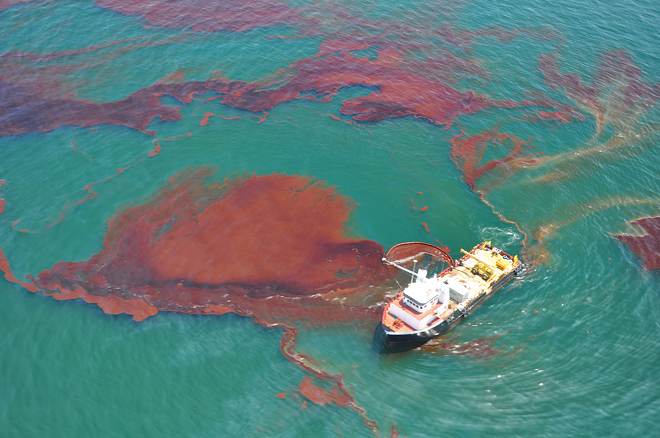 OK ALL YOU GREASERS: A skimmer cleans oil in the aftermath of the BP oil disaster. - OK ALL YOU GREASERS: A skimmer cleans oil in the aftermath of the BP oil disaster. - NOAA/Public domain