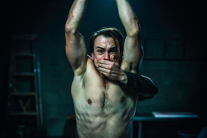 Rex (Ben O'Toole) has a problem, and it's clearly not his workout regimen, in the unpredictable 4-star cult classic, "Bloody Hell" - The Horror Collective
