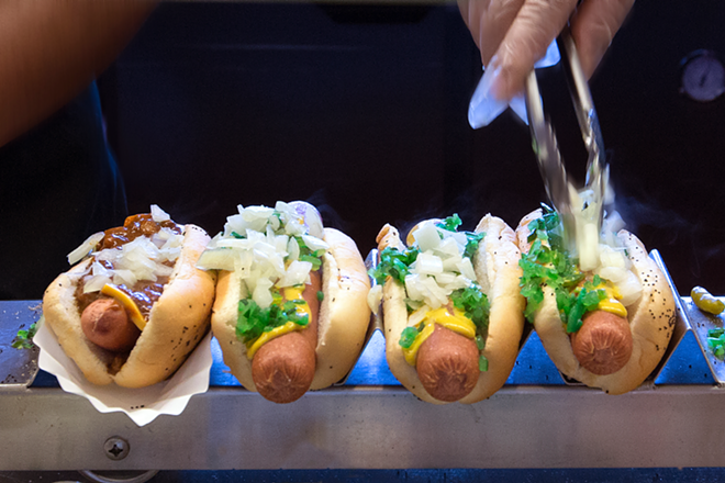 Portillo's hot dogs get dressed with neon green relish, chopped onions and more. - Chip Weiner