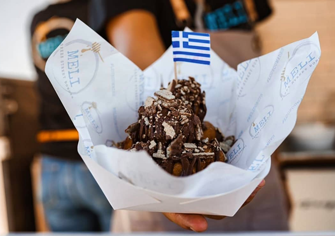 The Choco-fretta: topped with Greek candy bar "σοκοφρετα" combined with Greek chocolate, wafers and loaded with Nutella. - MELI GREEK STREET DONUTS/ FACEBOOK