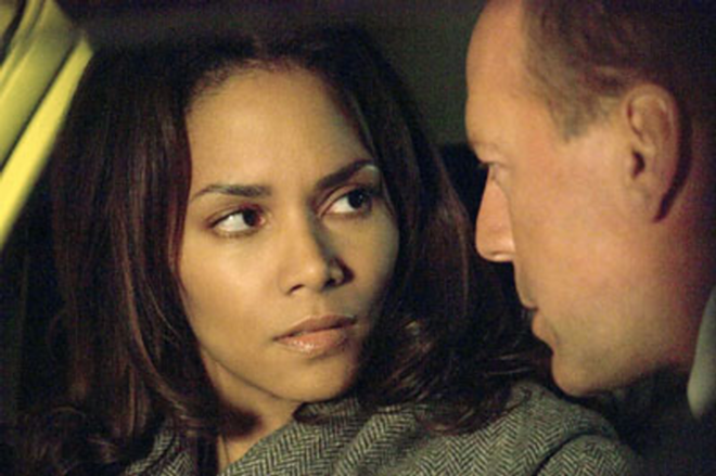 WHO DO YOU TRUST? Halle Berry plays an undercover reporter trying to get the goods on Bruce Willis in Perfect Stranger. - Sony Pictures