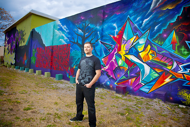 p>WALL POWER: Akut, aka Damir Tabakovic, who along with Center One, worked on a mural in St. Pete’s Warehouse Arts District, an enclave that showed marked growth in 2012. - SHANNA GILLETTE