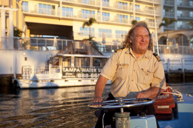 TAXI DRIVER: Laurence "Captain Larry" Salkin operates Tampa Water Taxi on the Hillsborough. "Even in these hard times," he says, "people still need to be entertained." - Chip Weiner Photographic Arts