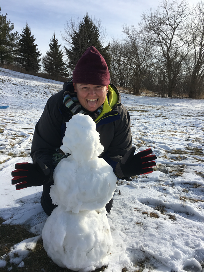 My wife Steph, the snowman-building pro. - Resie Waechter