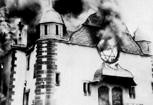 The synagogue in Siegen burning, November 10, 1938 — also known as s Kristallnacht (or "Night of Broken Glass"). - Public Domain