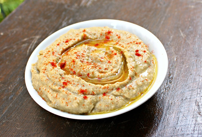 SCOOP-WORTHY: Adding roasted - eggplant to a traditional hummus recipe adds smokiness and depth to the dip. - Katie Machol Simon