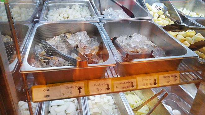 The all-you-can-eat buffet's seafood selection includes scallops, shrimp and crab. - Meaghan Habuda