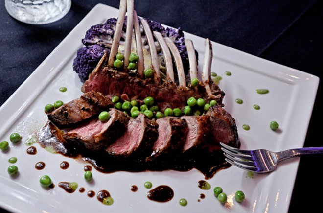 English peas top the rosy rack of lamb, which features an irresistible sauce. - Jasmine Wildflower Osmond