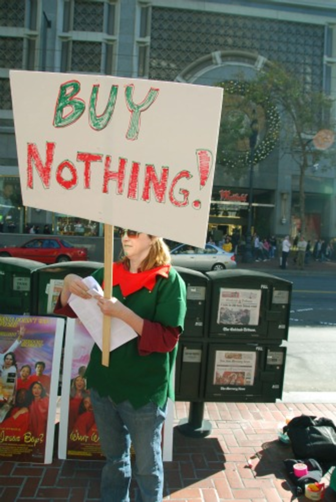 William Rees of the University of British Columbia reports that human society is in a “global overshoot,” consuming 30 percent more material than is sustainable from the world’s resources. Pictured: A "Buy Nothing Day" activist leaflets in San Francisco. - Steve Rhodes