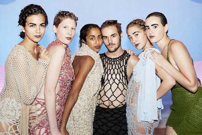 Joshua Veasey with the models at Wearable Art 7. - Chip Weiner