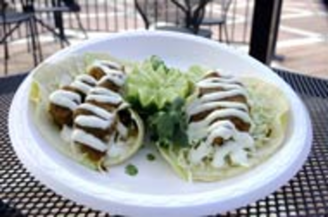 ADOBO TO GO: The excellent taco from Adobo Grill. - LISA MAURIELLO