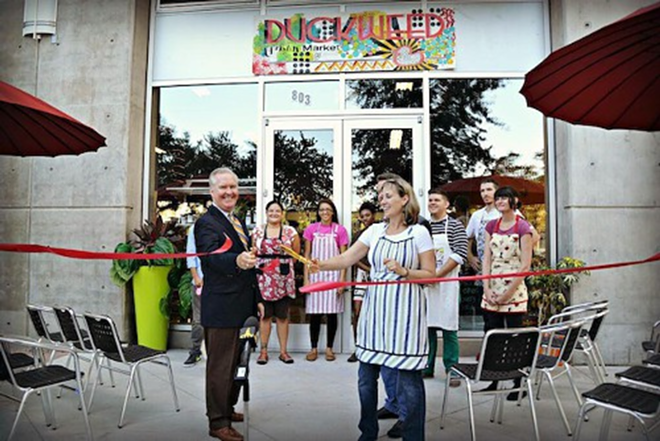 Tampa Mayor Bob Buckhorn (left) officially opening Duckweed's new space for business last week. - DUCKWEED URBAN MARKET