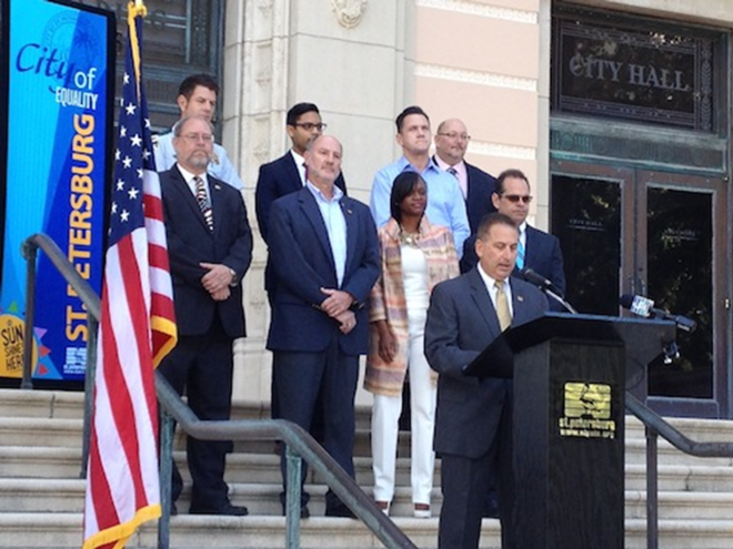 Mayor Rick Kriseman, city officials, and representatives of Equality Florida and the Human Rights Campaign announce St. Pete's perfect score from the steps of City  Hall. - Larry Biddle