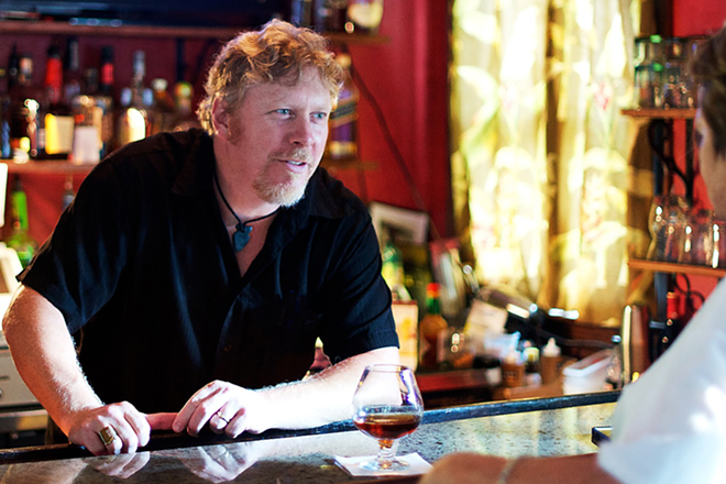 Gulfport Mayor Sam Henderson, who moonlights as a bartender, in Aug. 2014. - Kevin Tighe