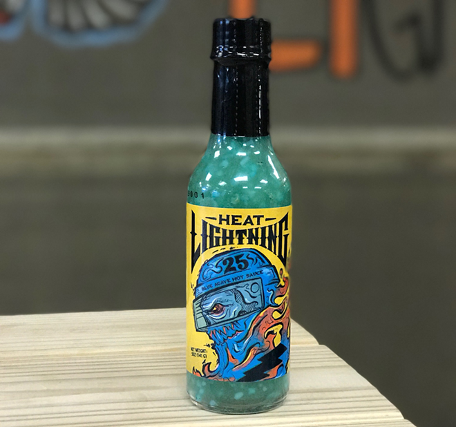 Heat Lightning is a tropical blue agave hot sauce, made in honor of a Tampa Bay Lightning milestone. - Tijuana Flats