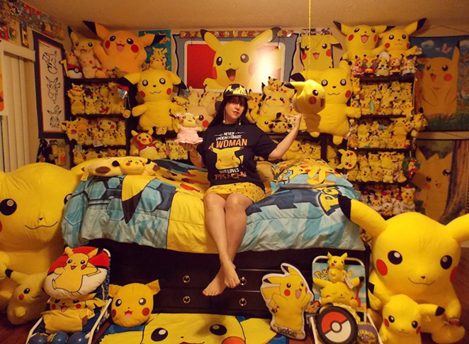 Belle Starenchak sits in her “Chuseum” of more than 22,000 Pikachu items. The collection has a Guinness World Record. - c/o Belle Starenchak aka 'Pikabellechu'
