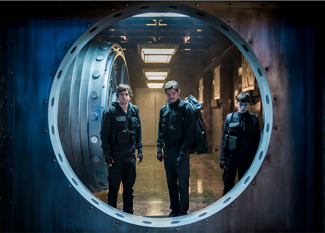 Freddie Highmore, left, stars as a genius engineer recruited to help break into an impenetrable safe in "The Vault" - Saban Films/Paramount Pictures