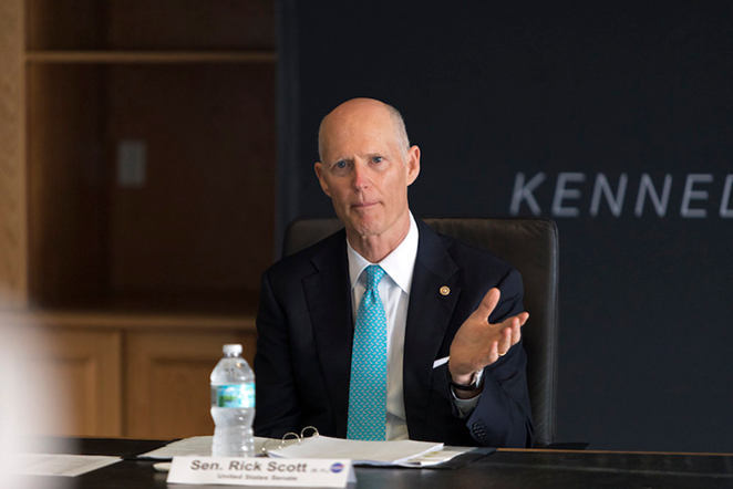 U.S. Sen. Rick Scott speaks during a roundtable discussion among Kennedy Space Center Director Bob Cabana and multi-user spaceport partners at Kennedy’s Saturn V Conference Center on March 15, 2019. The meeting was held to discuss the needs of the space center and Cape Canaveral Air Force Station - NASA/Frank Michaux