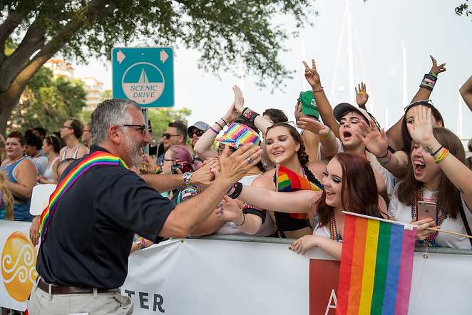 Mayor Rick Kriseman greets parade goers in St. Petersburg, Florida on June 25, 2018. - CITYOFSTPETE/FLICKR