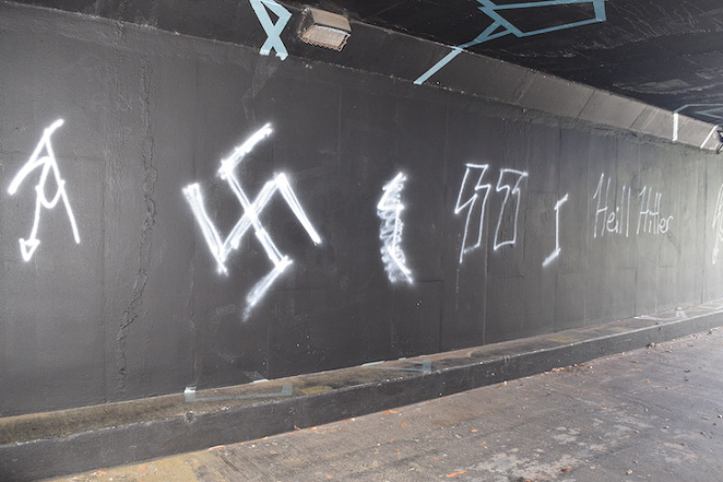 Swastika, and other Nazi symbols spray-painted over SHINE mural at Rays Tunnel in St. Pete