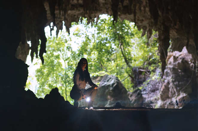 Cristina (Brigitte Kali Canales) returns to Veracruz for a reason we can't spoil, which leads her to this cave, which may be home to the demon Postehki. - Dark Star Pictures