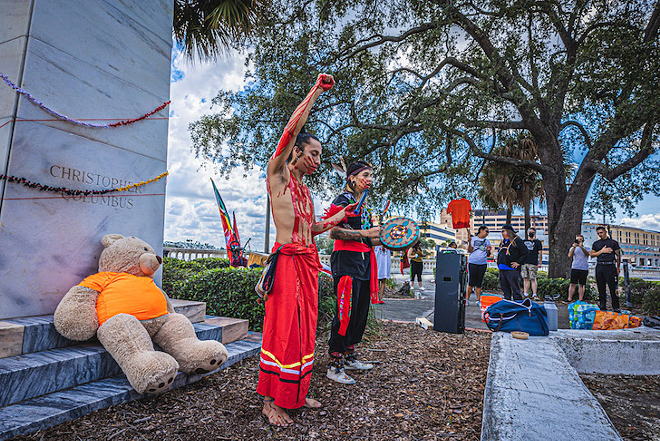 FIA members protest Tampa's Columbus statue. - DAVE DECKER