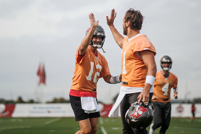 Tom Brady (L) and Blaine Gabbert during practice at AdventHealth Training Center in Tampa, Florida on Jan. 21, 2022. - KYLE ZEDAKER/TAMPA BAY BUCCANEERS