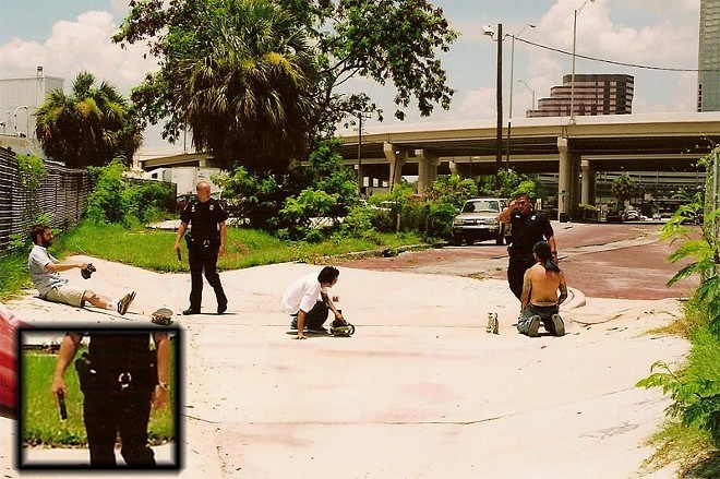 TPD officers approach Morenek and other skaters at Turtle Ditch. - Photo c/o Rob Morenek
