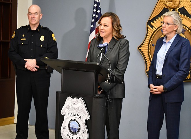 Mary O'Connor speaks during a press conference announcing her new role as police chief next to Assistant Chief Lee Bercaw and Mayor Castor. - JUSTIN GARCIA