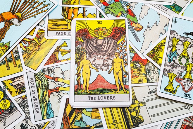 The Lovers card is the emotional powerhouse in this spread. - Photo via volkovslava/Adobe