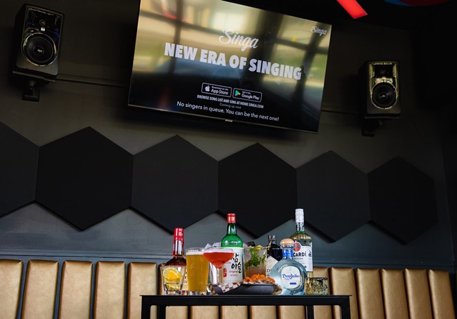 Available for $10 per person per hour, Gangchu's karaoke room experience allows up to 12 guests to choose from one of the largest licensed karaoke song catalogs in Tampa Bay. - Photo by Mark Blohm