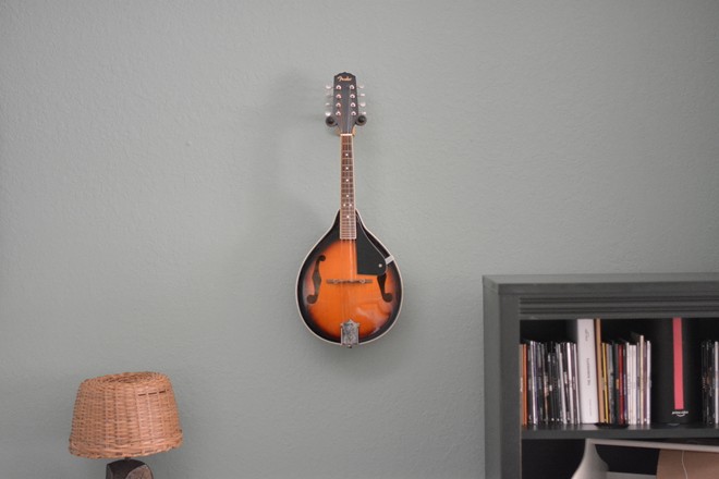 The mandolin which hangs from the wall in Hurtak's house. - Tim Burke