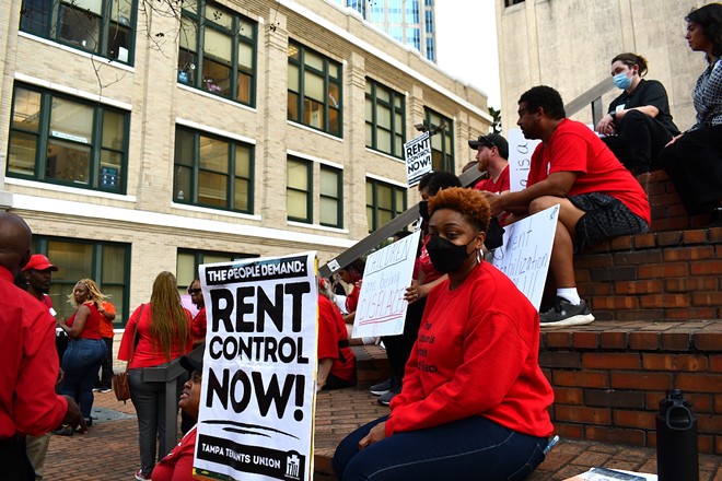 Protesters outside of Tampa City Hall demand rent control last March. - JUSTIN GARCIA