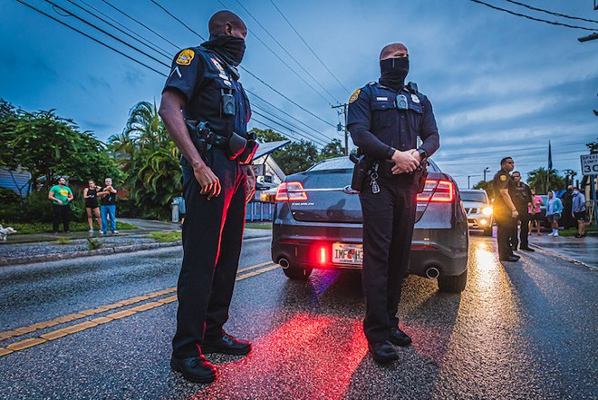 Tampa police officers in September 2020. - DAVE DECKER