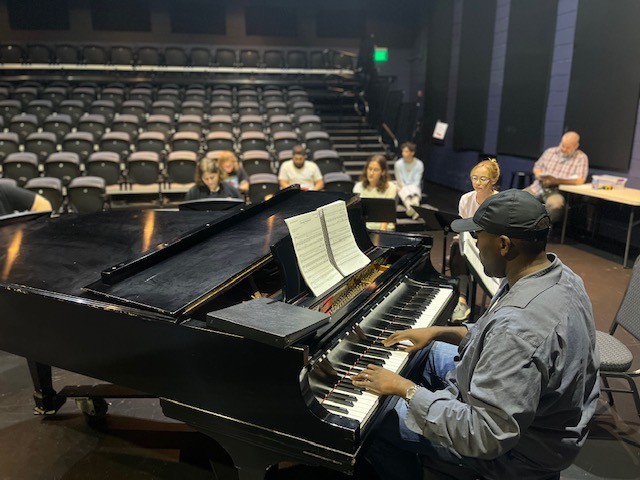Musical director, Yohance Wicks, rehearsing with cast members for 'Sunday in the Park with George,' happening June 30-July 2, 2022 at Ruth Eckerd Hall in Clearwater, Florida.
