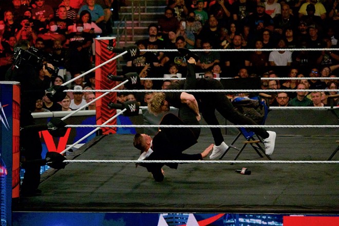 Paul body slammed The Miz after challenging the longtime WWE villain to a one-on-one match at SummerSlam. - Max Steele